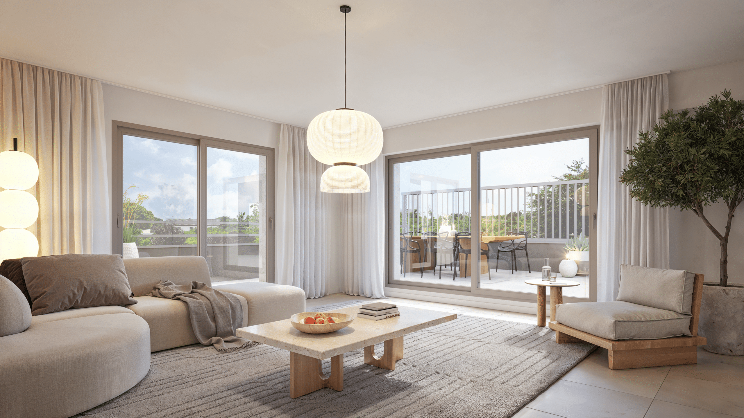 Immobilier neuf à Thionville : salon d'un appartement de standing avec grande terrasse extérieure et double vitrage coulissant.