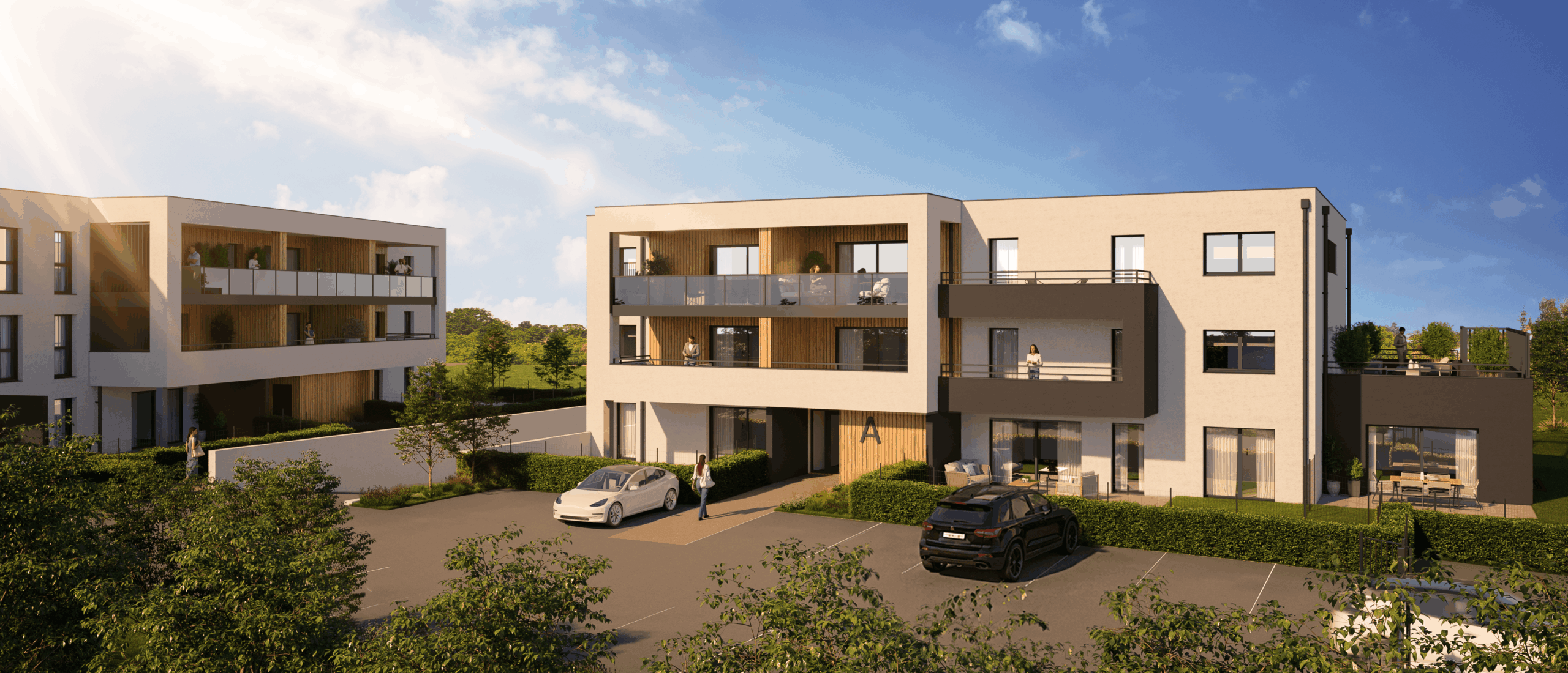 Façade moderne et parkings privatifs de la résidence immobilière Lumina à Garche.>